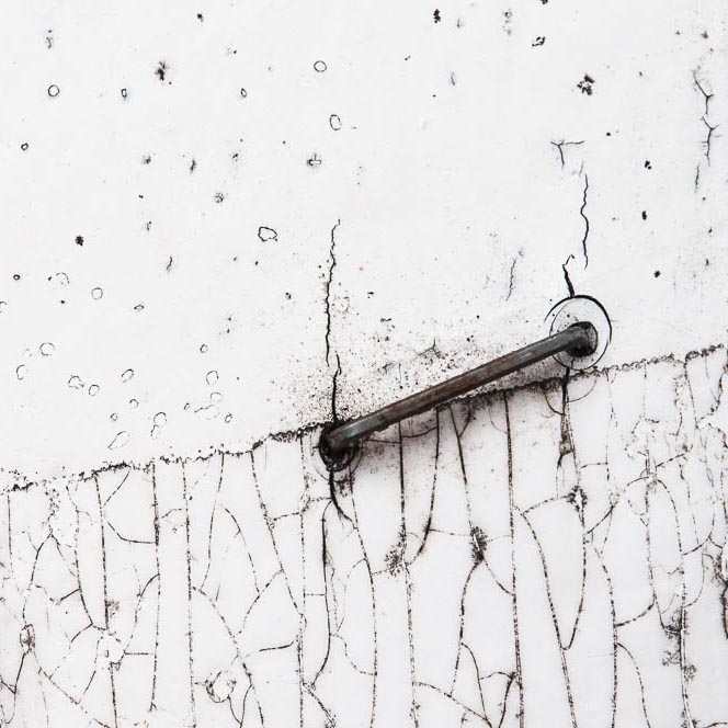 stapler pin with remains of adhesive tape