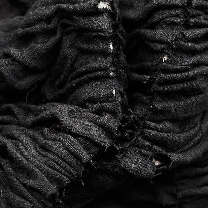 gathered, black textile from the alpaca