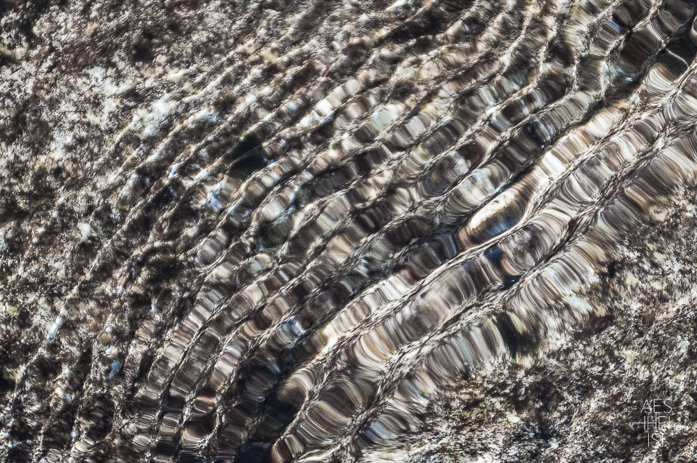 second picture: shafts of sunlight painting pattern into water