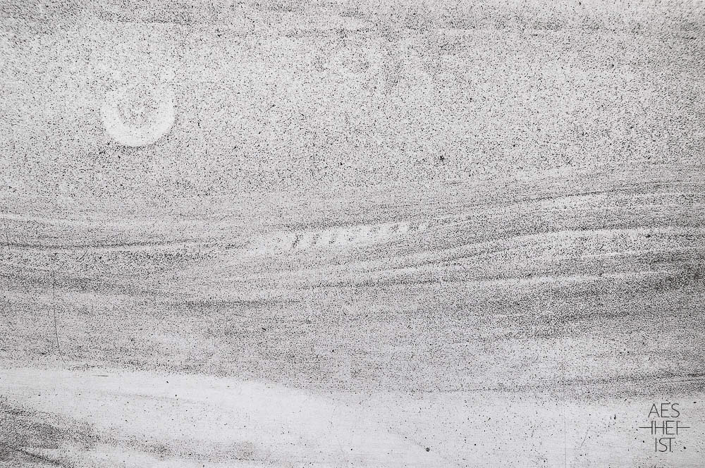 third picture: the dust seams to show a flat, silent landscape with moon